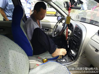 Illustration for article titled Armless Man Pulled Over, Discovered Driving with His Feet